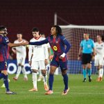 Eric Garcia and Jules Kounde celebrate during Barcelona's win over Eintracht Frankfurt in the Champions League.