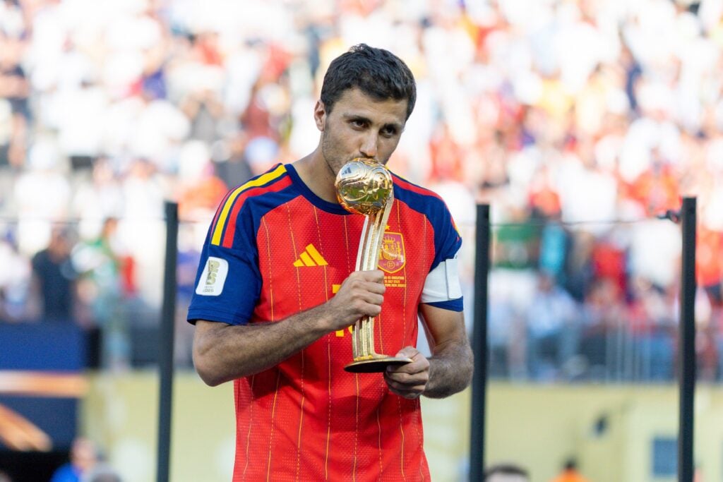 Spain midfielder Rodri with the Golden Ball award. The midfielder is wanted by both Barcelona and Real Madrid