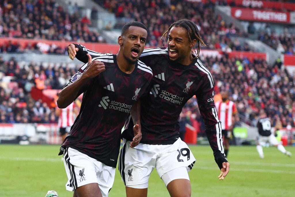 Alexander Isak and Bradley Barcola celebrate a Liverpool goal against Brentford