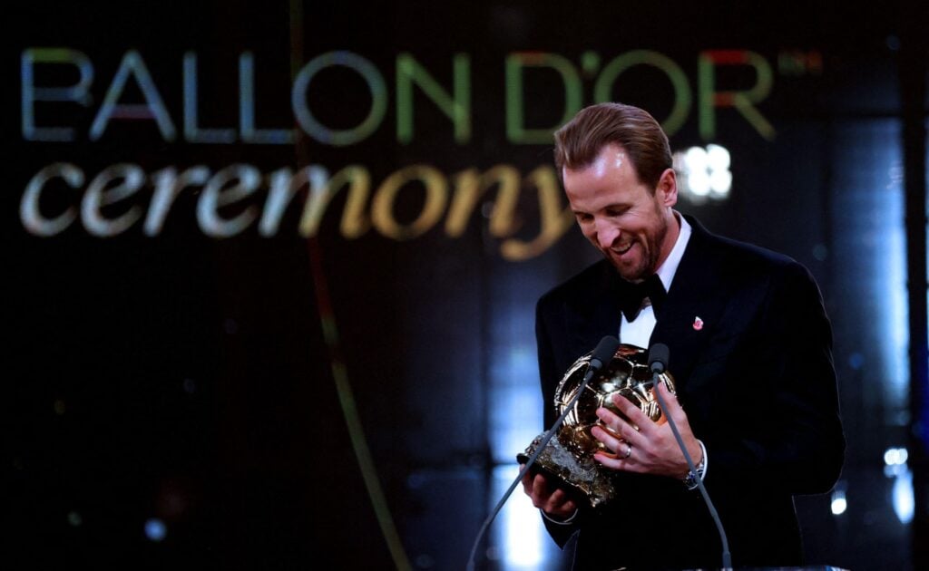 Harry Kane holds the Ballon d'Or trophy at the 2026 ceremony in London