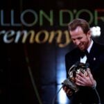 Harry Kane holds the Ballon d'Or trophy at the 2026 ceremony in London