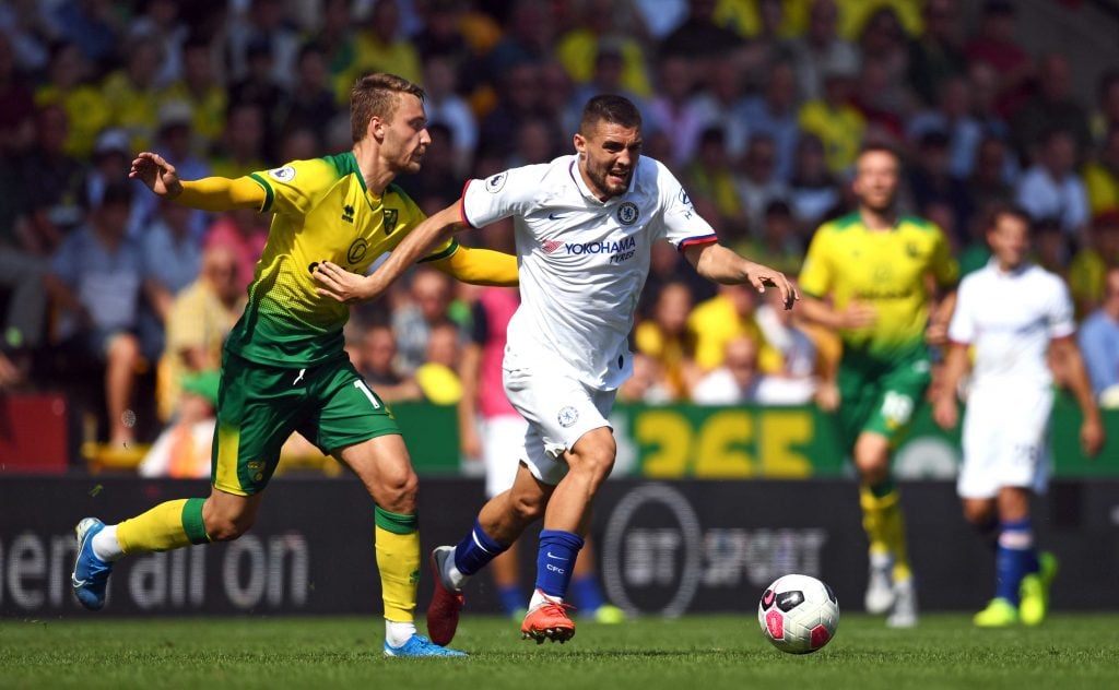 Norwich City's Tom Trybull and Chelsea's Mateo Kovacic battle for the ball