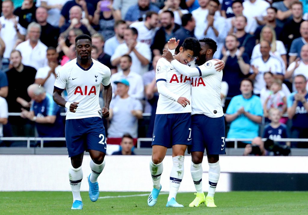 Son Heung-min celebrates scoring for Tottenham with Serge Aurier and Danny Rose