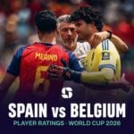 Spain's Mikel Merino embraces a Belgium player at full time after Spain's World Cup 2026 quarter-final win.